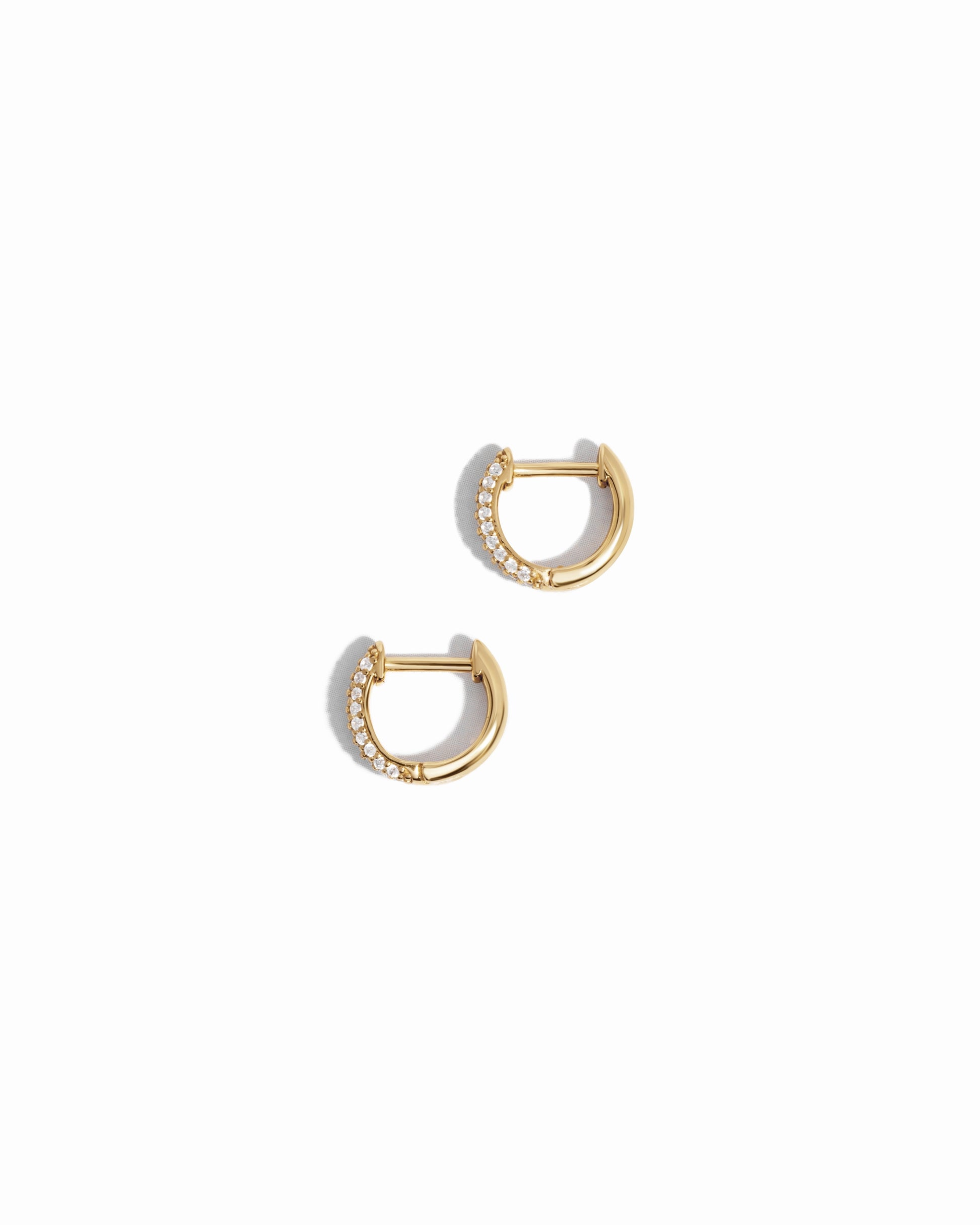 image of delicate earrings featuring a minimalist small hoop earring design 