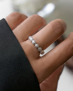 Model wearing sterling silver 7 stone stacking ring