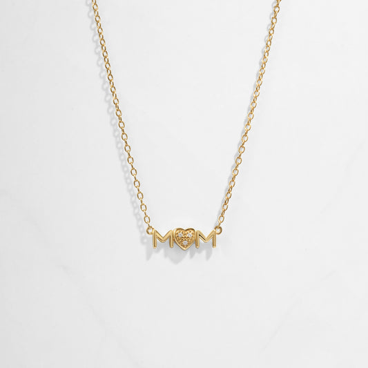Closeup image of gold heart necklace for her