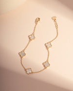 gold four leaf clover stackable chain bracelet with mother of pearl charms