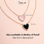 infographic of the mother of pearl and black onyx style variations available for this heart pendant necklace