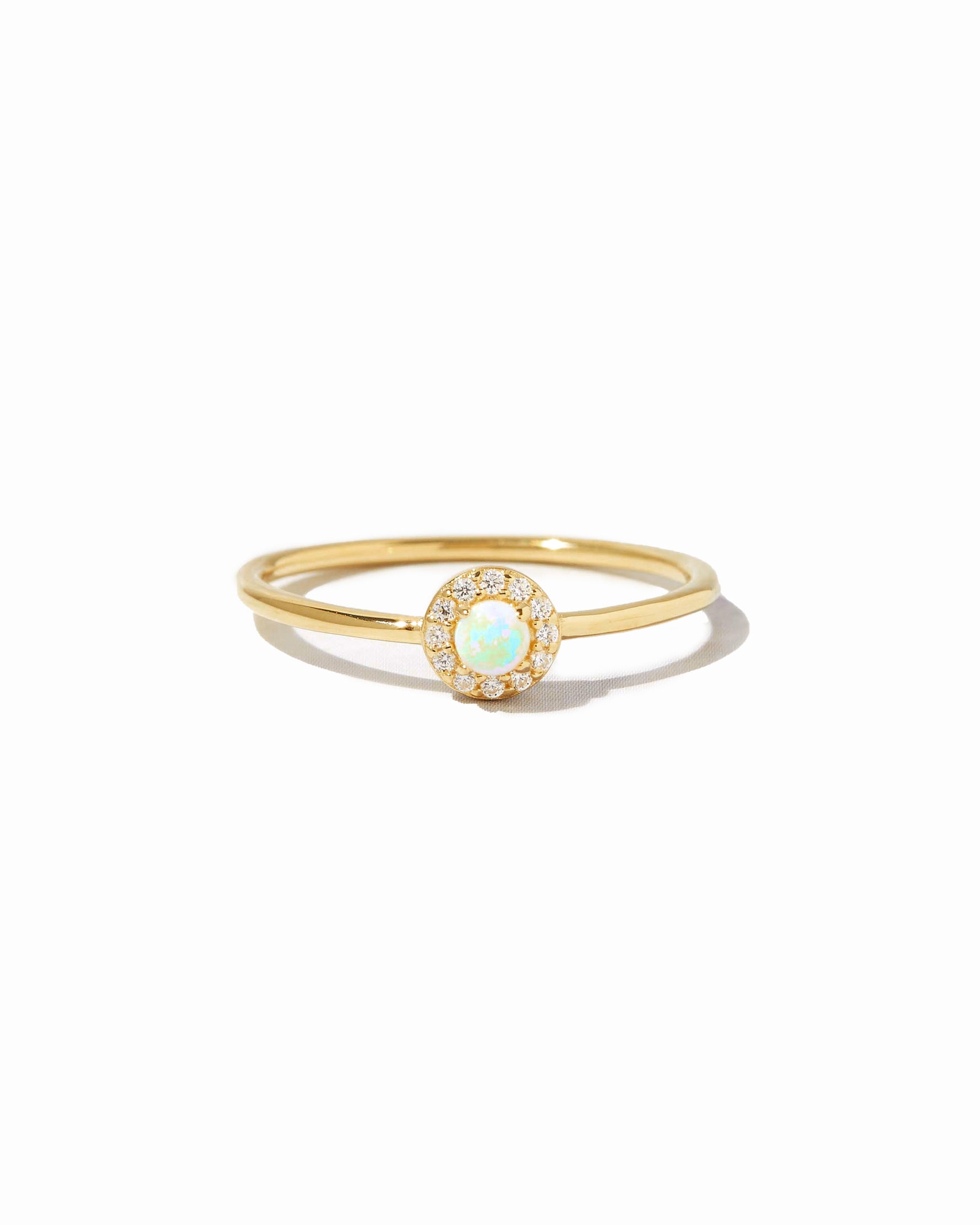 round gold opal ring with cz stones