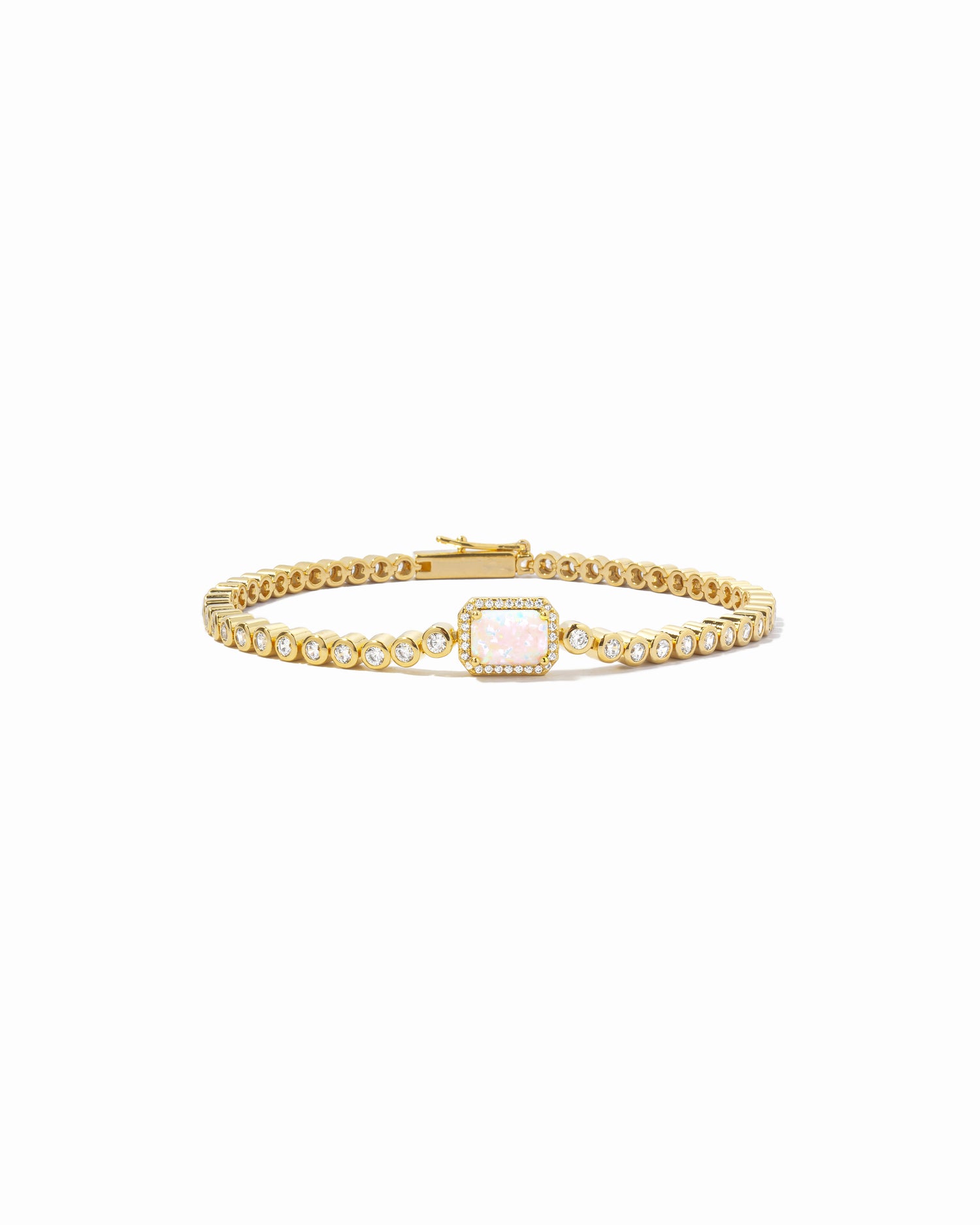 opal baguette charm on dainty gold tennis bracelet