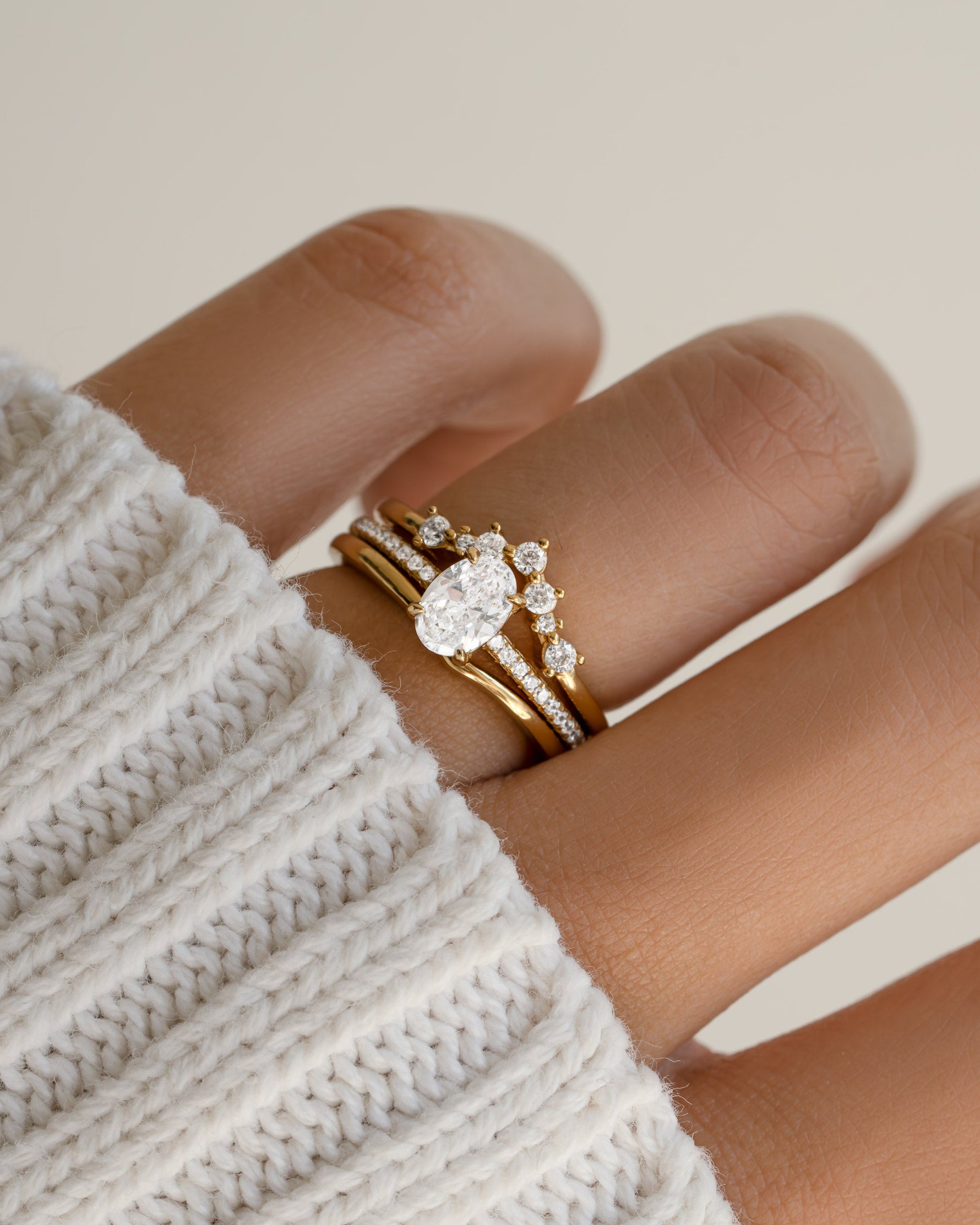 Gold promise ring set on model
