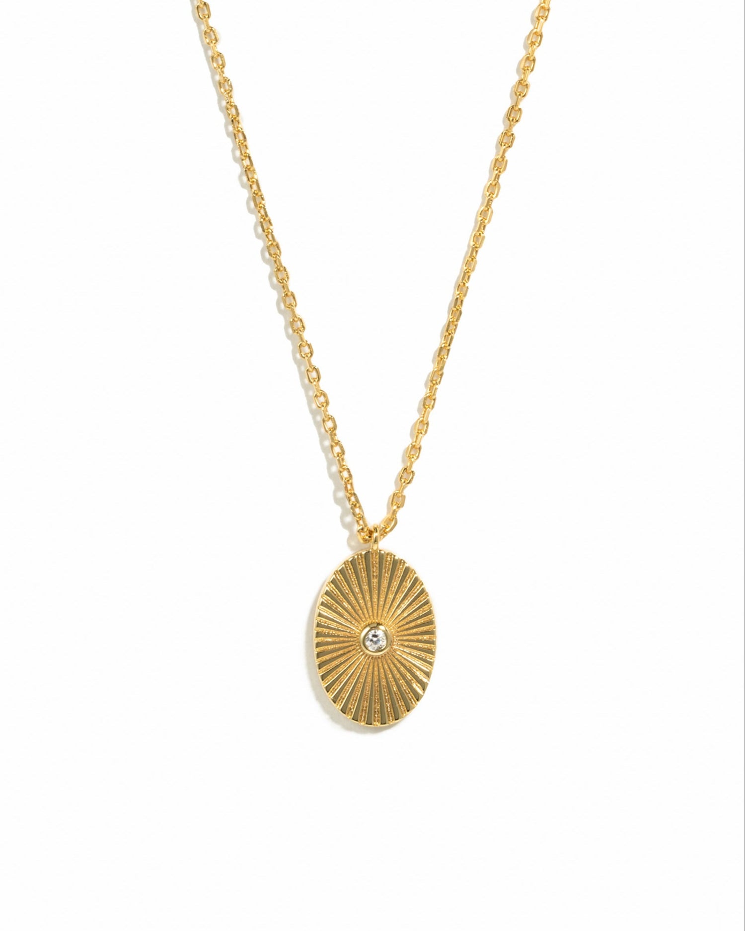 oval medallion necklace with fluted design