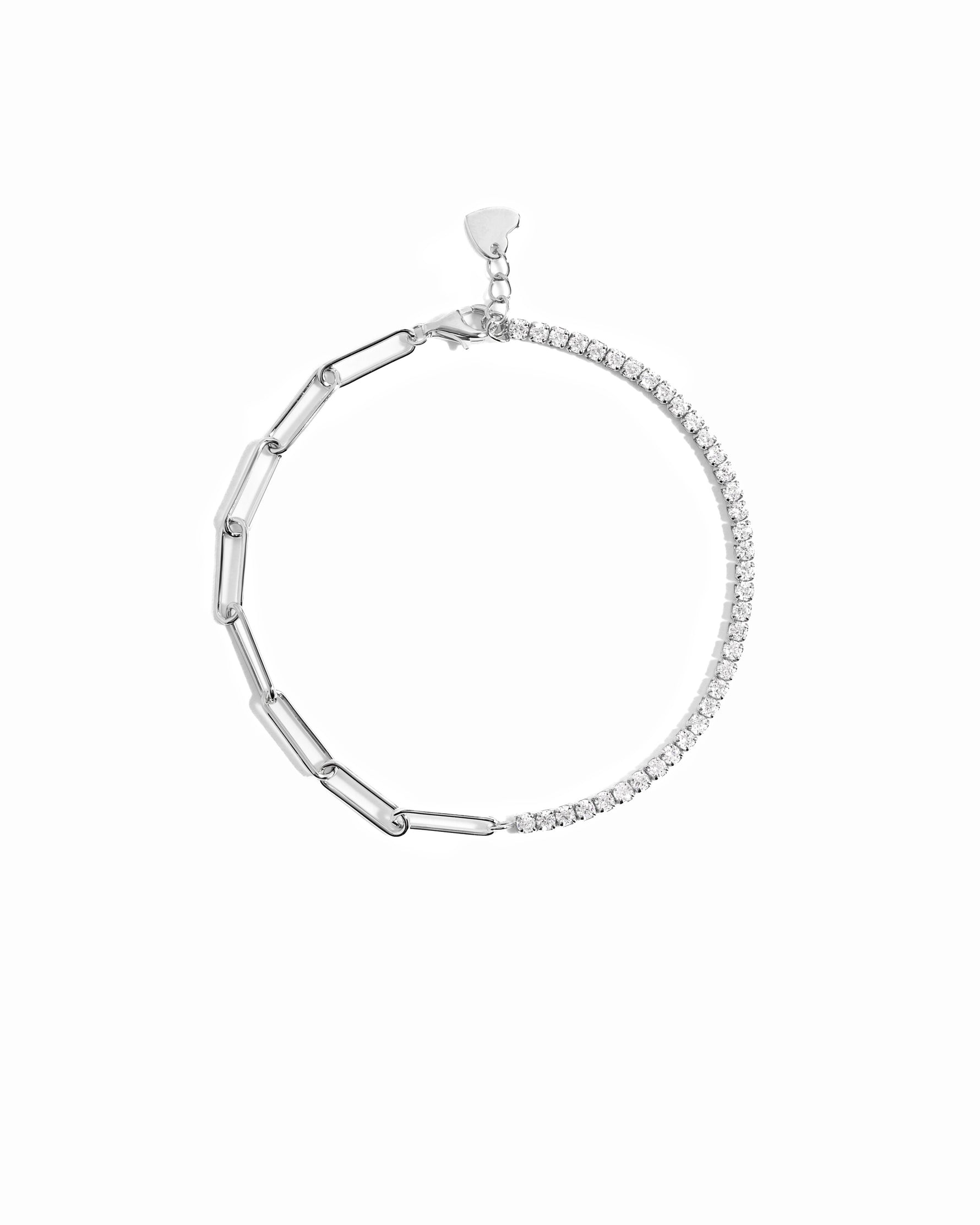 closeup image of silver bracelet with tennis chain and paperclip chain