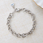 Closeup image of silver chain with chunky jewelry design