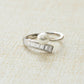 spiral pearl stacking ring with baguette ring design in sterling silver
