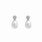 closeup image of sterling silver perl drop earrings with a cubic zirconia bezel-set stone