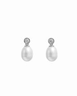 closeup image of sterling silver perl drop earrings with a cubic zirconia bezel-set stone