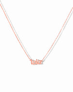 Rose gold name plate necklaces. 