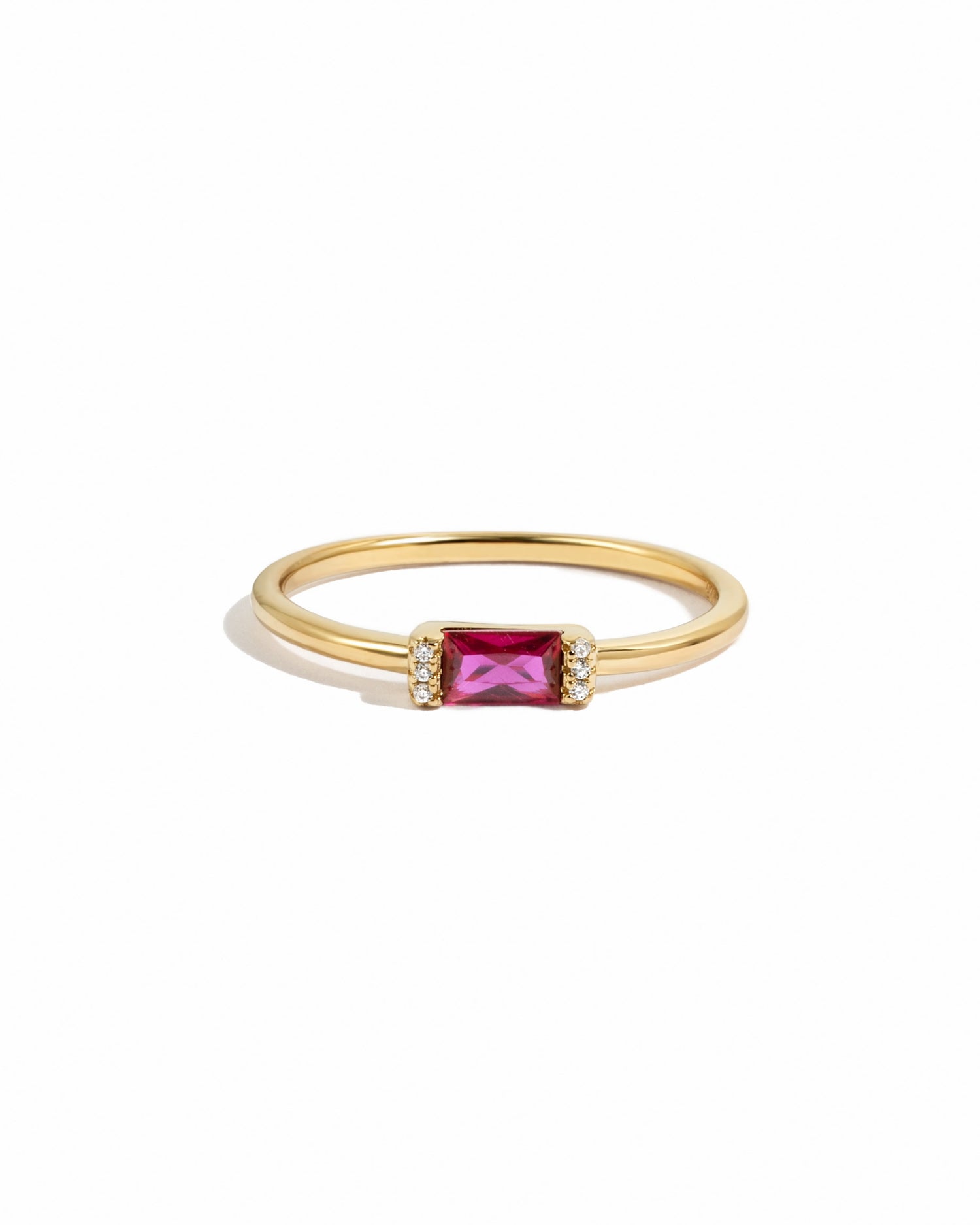gold baguette ring with ruby stone