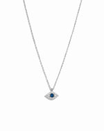 Silver necklace with a blue evil eye gemstone pendant on a white background
