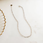 Closeup image of beach wedding silver ankle bracelet jewelry set