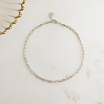 closeup of sterling silver ankle bracelets