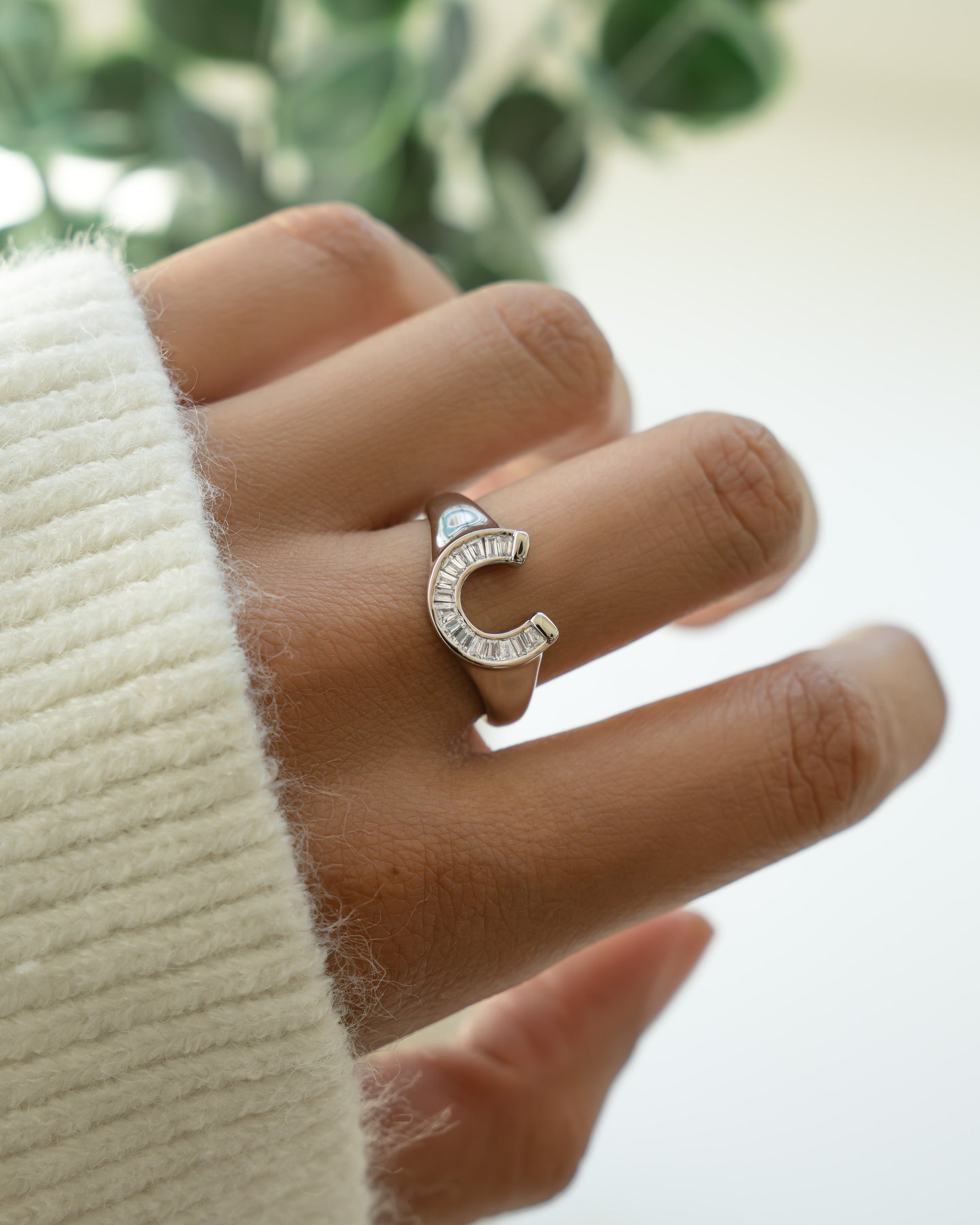 Silver unique ring with a signet ring design and baguette cut stones