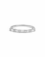sterling silver ring with small baguette diamonds on a white background