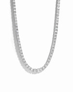 White cubic zirconia diamond necklace on a white background