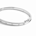 closeup image of silver studded bangle bracelet