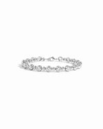 Silver tennis bracelet with bead and bezel accents