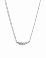  Curved Diamond Bezel Bar Necklace in silver on white background