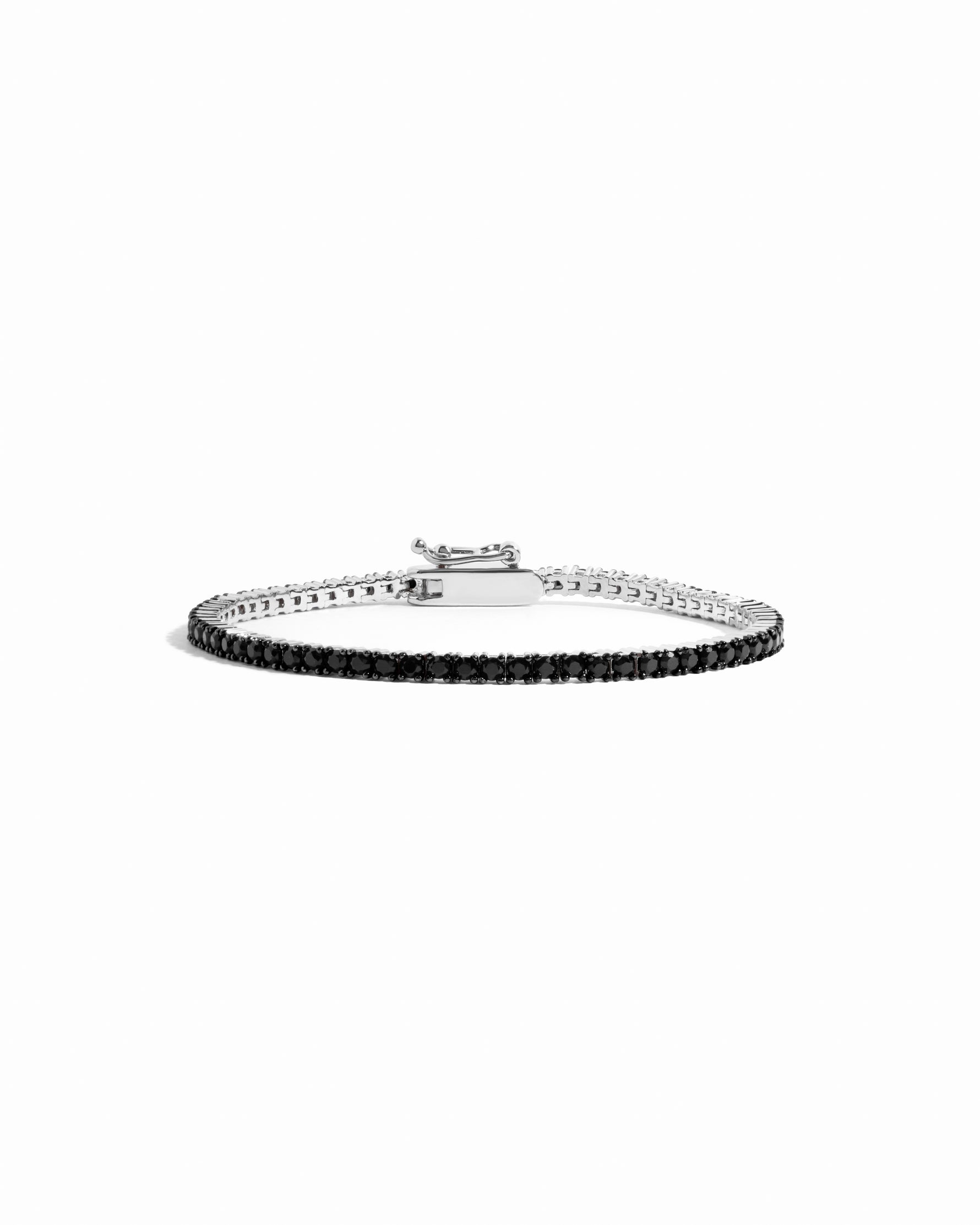 silver tennis bracelet with black stones