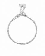Silver stacking bracelet set on a white background