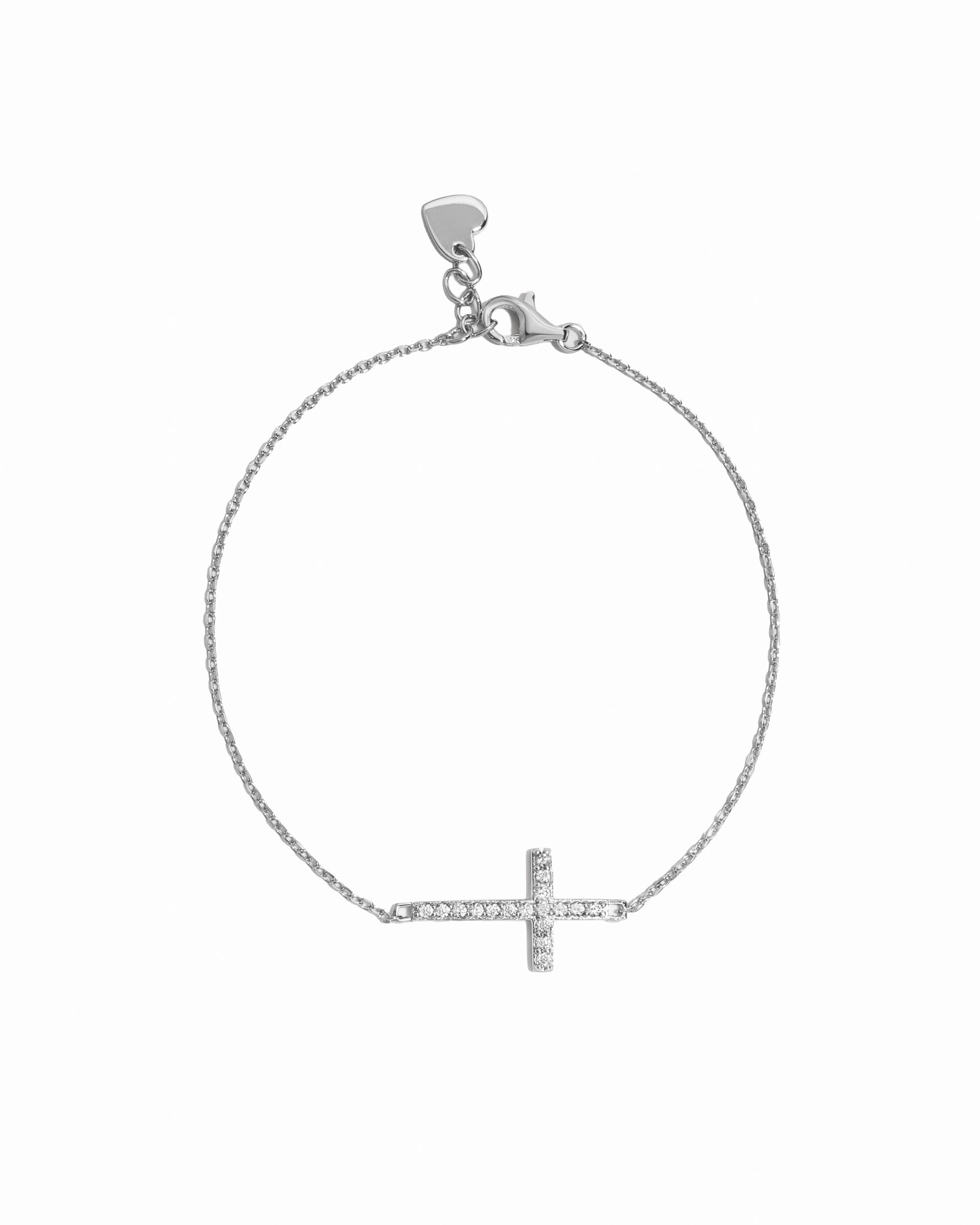Sterling silver bracelet with a small cross pendant on a white background