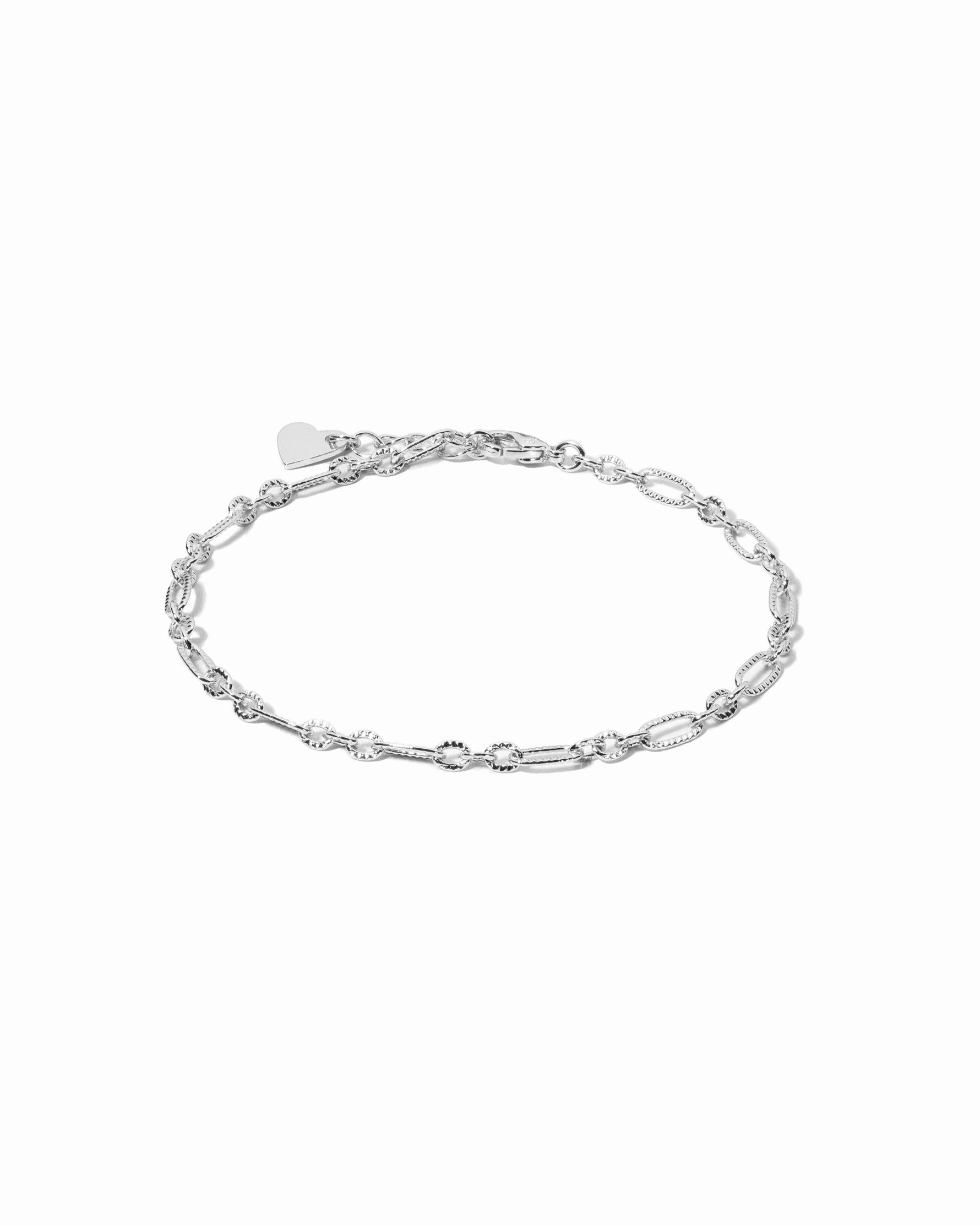 closeup image of silver chain bracelet