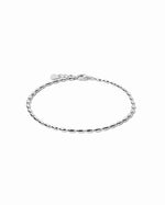 Silver beaded chain bracelet on a white background