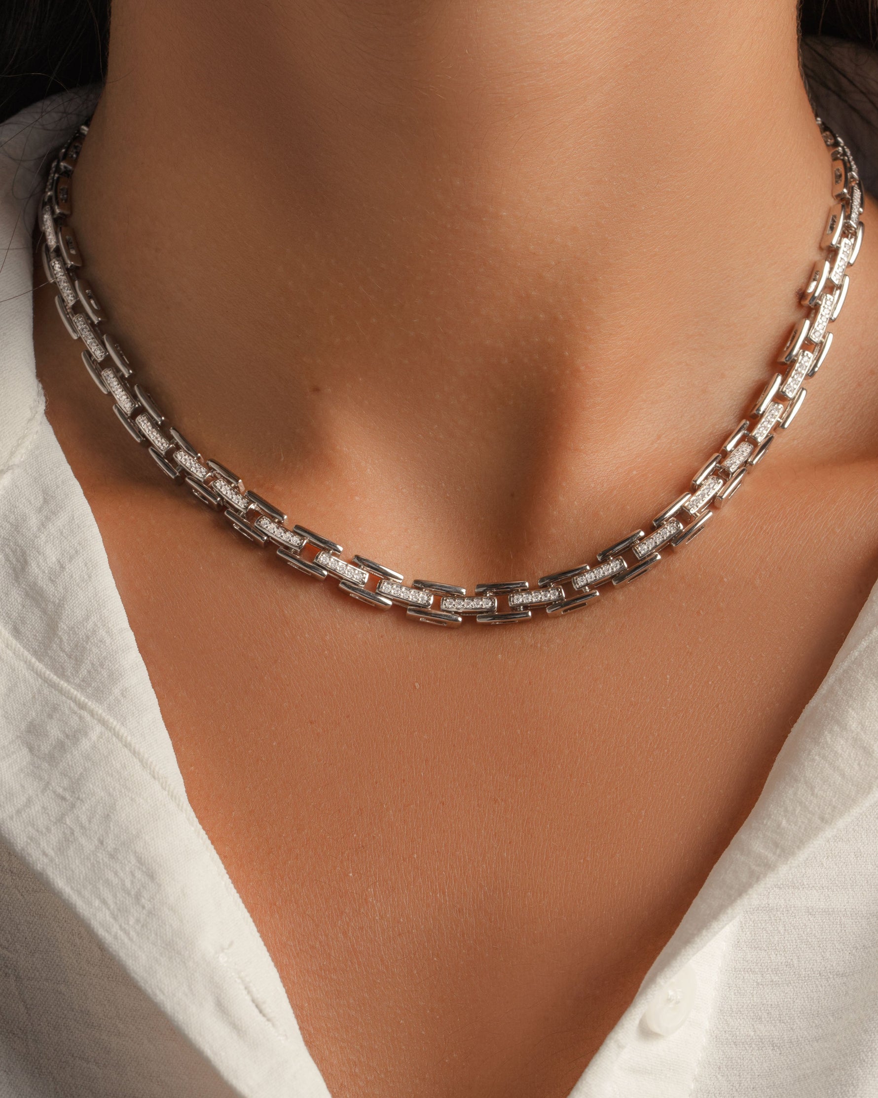 Silver chain necklace on model