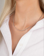 Silver chain necklace on model