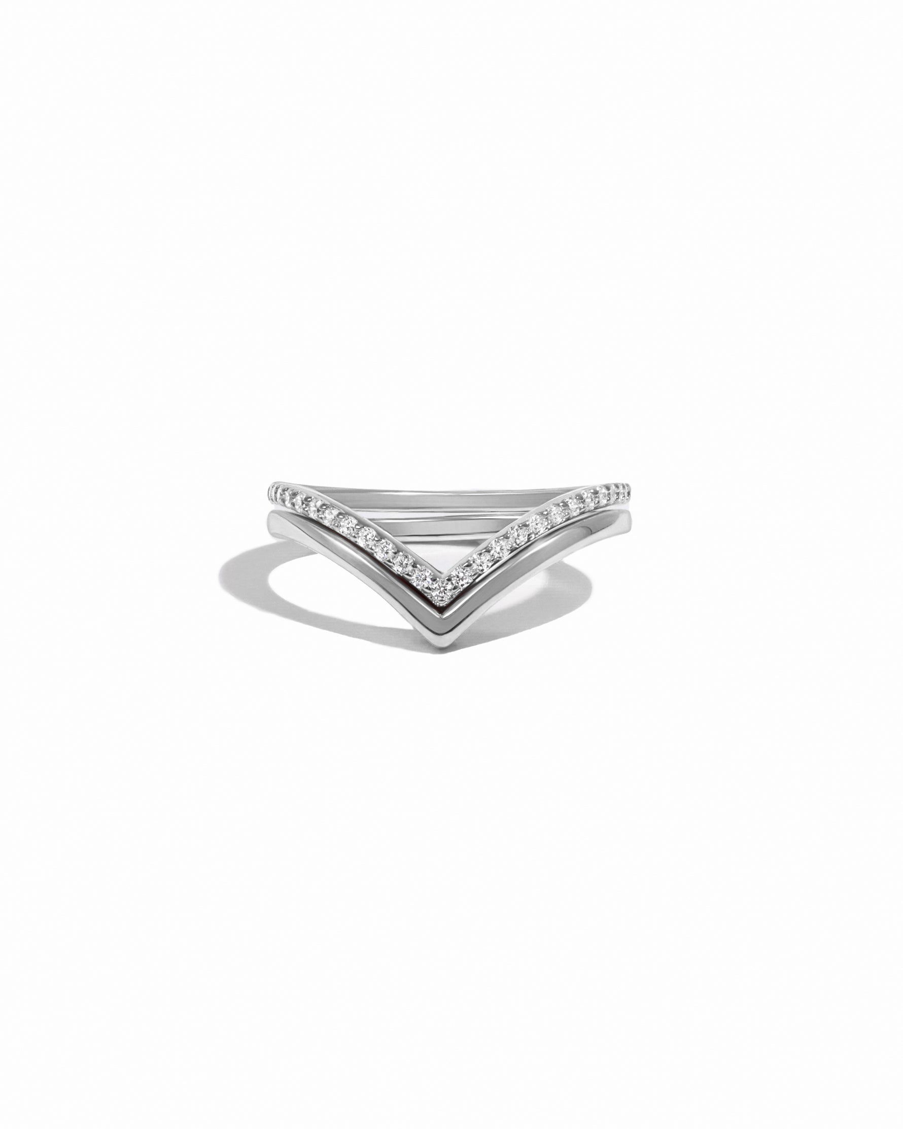 Chevron ring set in sterling silver on white background. 