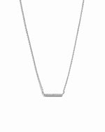 Silver necklace with a bar pendant on a white background