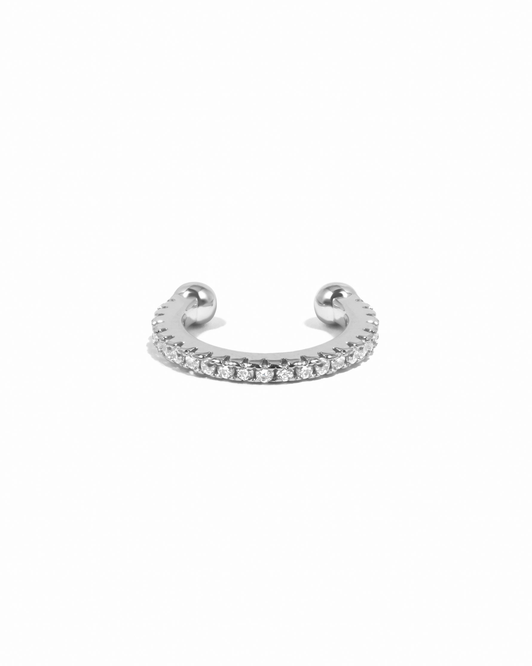 Sterling silver diamond ear cuff on a white background