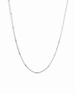 sterling silver chain necklace on a white background 