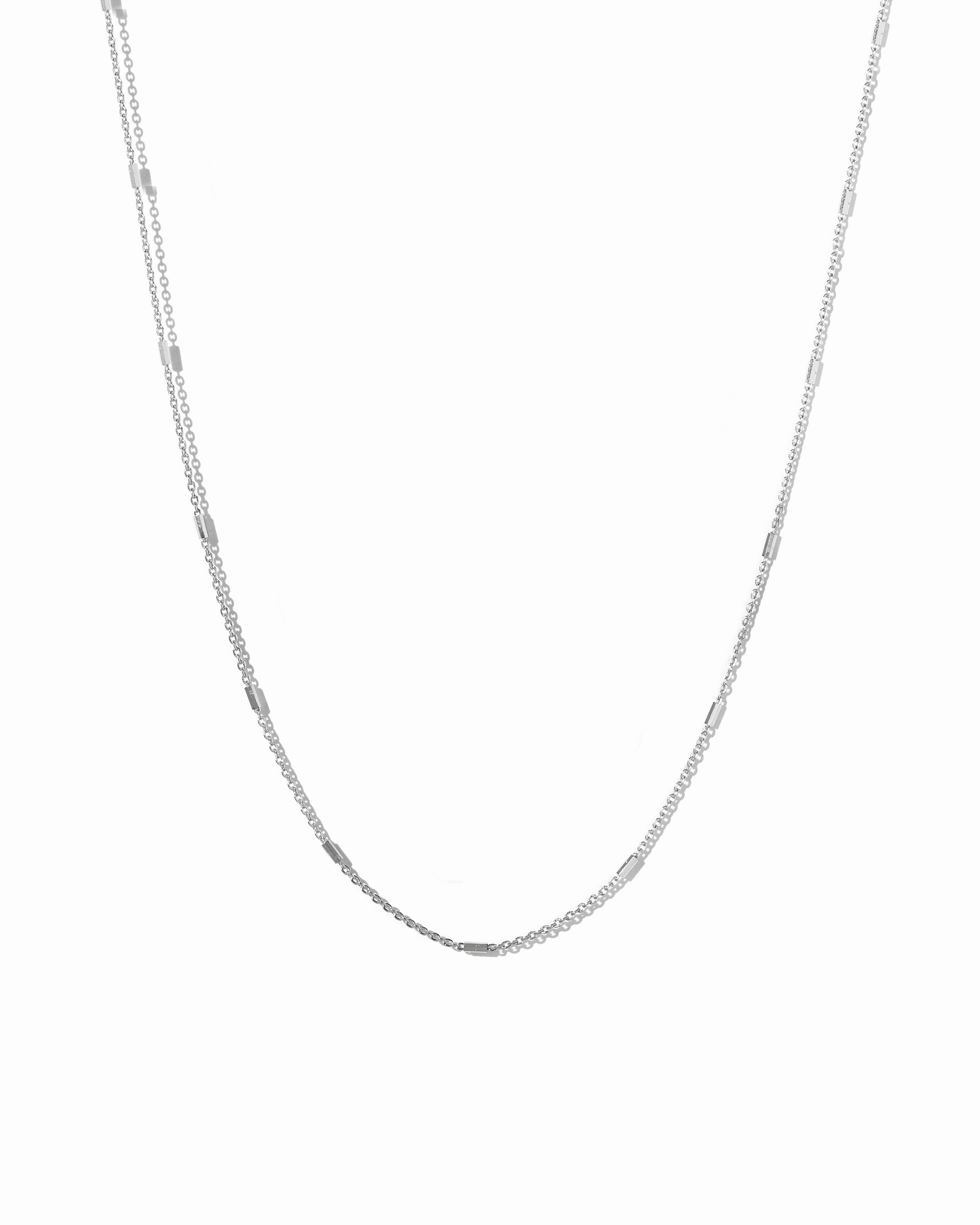 sterling silver chain necklace on a white background 