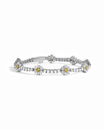 Silver tennis bracelet with floral cubic zirconia design
