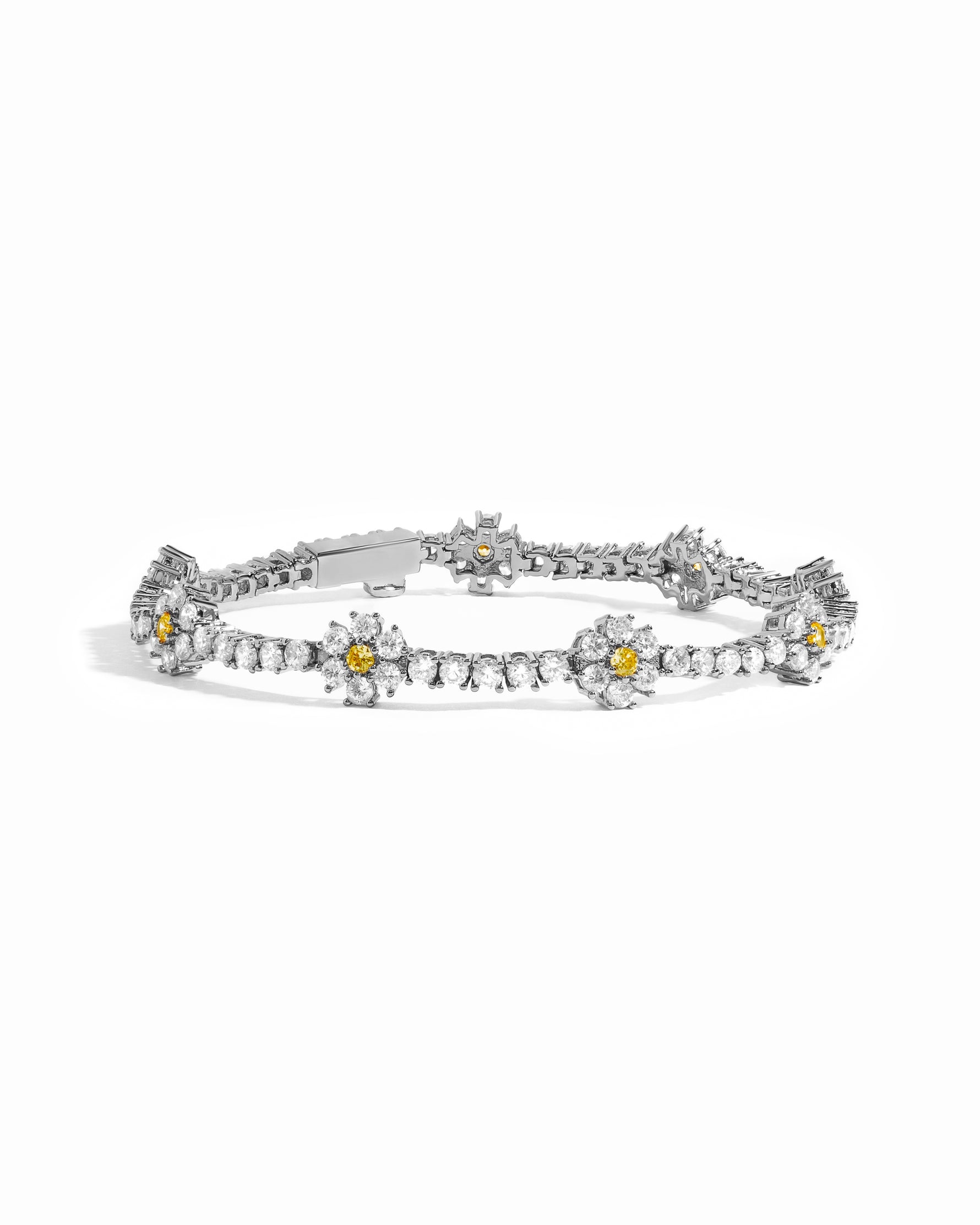 Silver tennis bracelet with floral cubic zirconia design