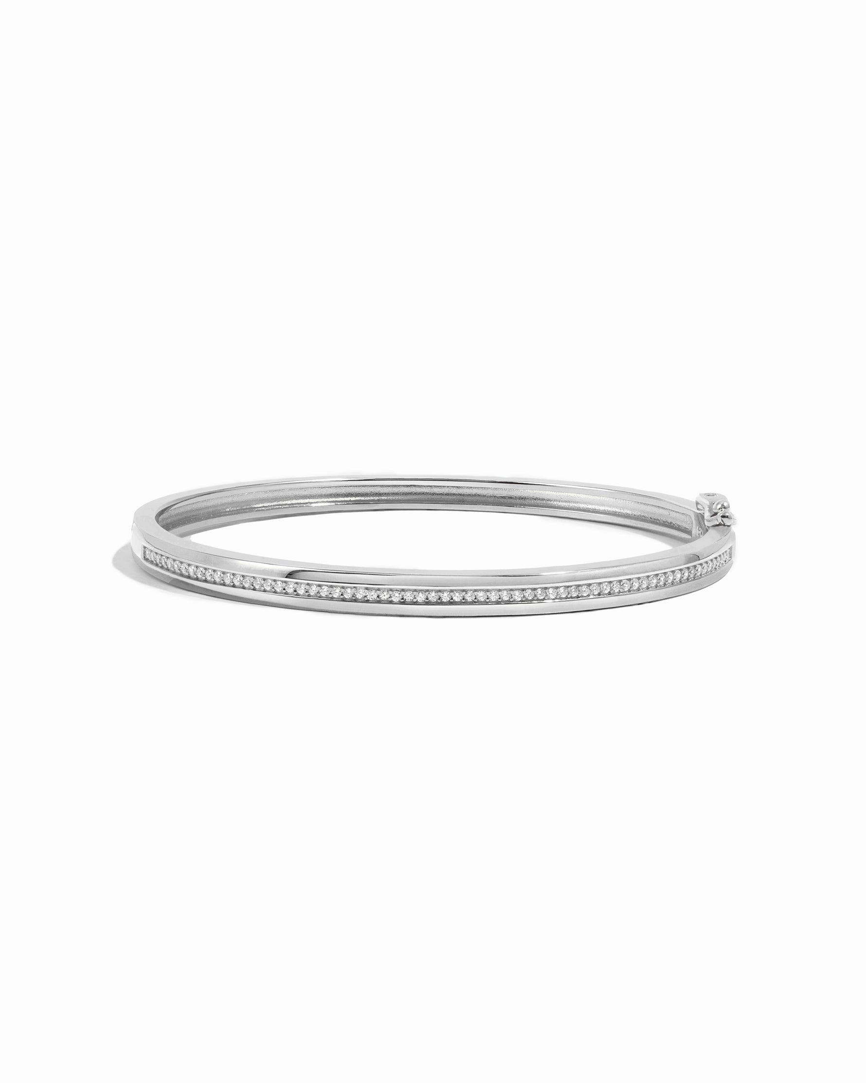 Sterling silver diamond bracelet bangle on a white background