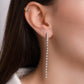 Silver drop earrings with delicate hanging gemstones, creating a soft touch and elegant sway, ideal for prom jewelry.