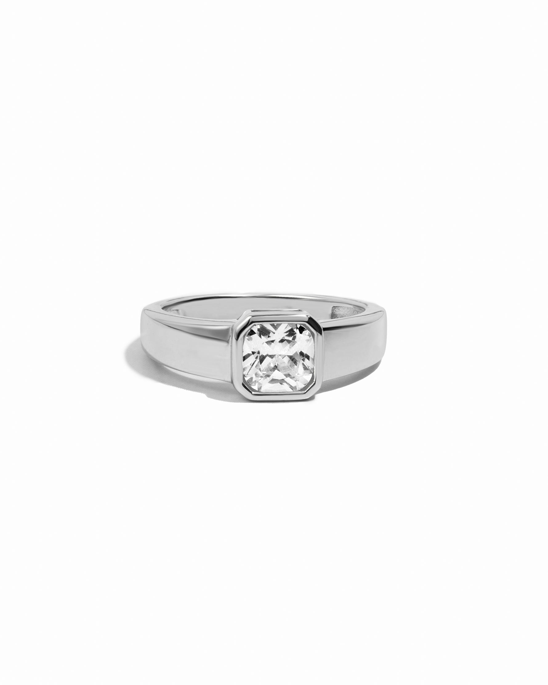 sterling silver signet ring with cubic zirconia stone on white background
