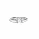 closeup image of silver emerald cut stacking ring