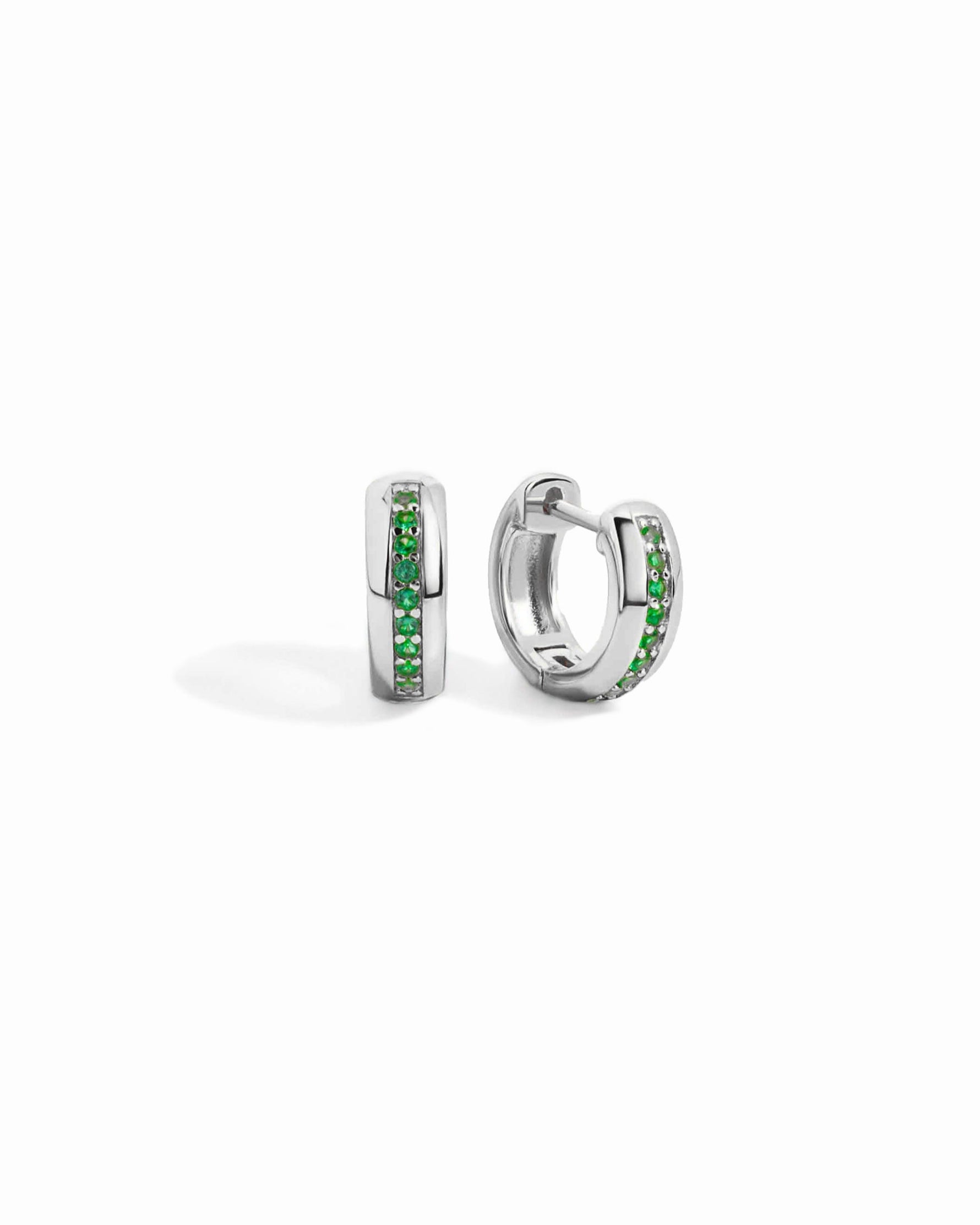 a pair of sterling silver hoop earrings with may birthstones down the center of the earring