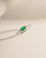 sterling silver cz ring with emerald green baguette 
