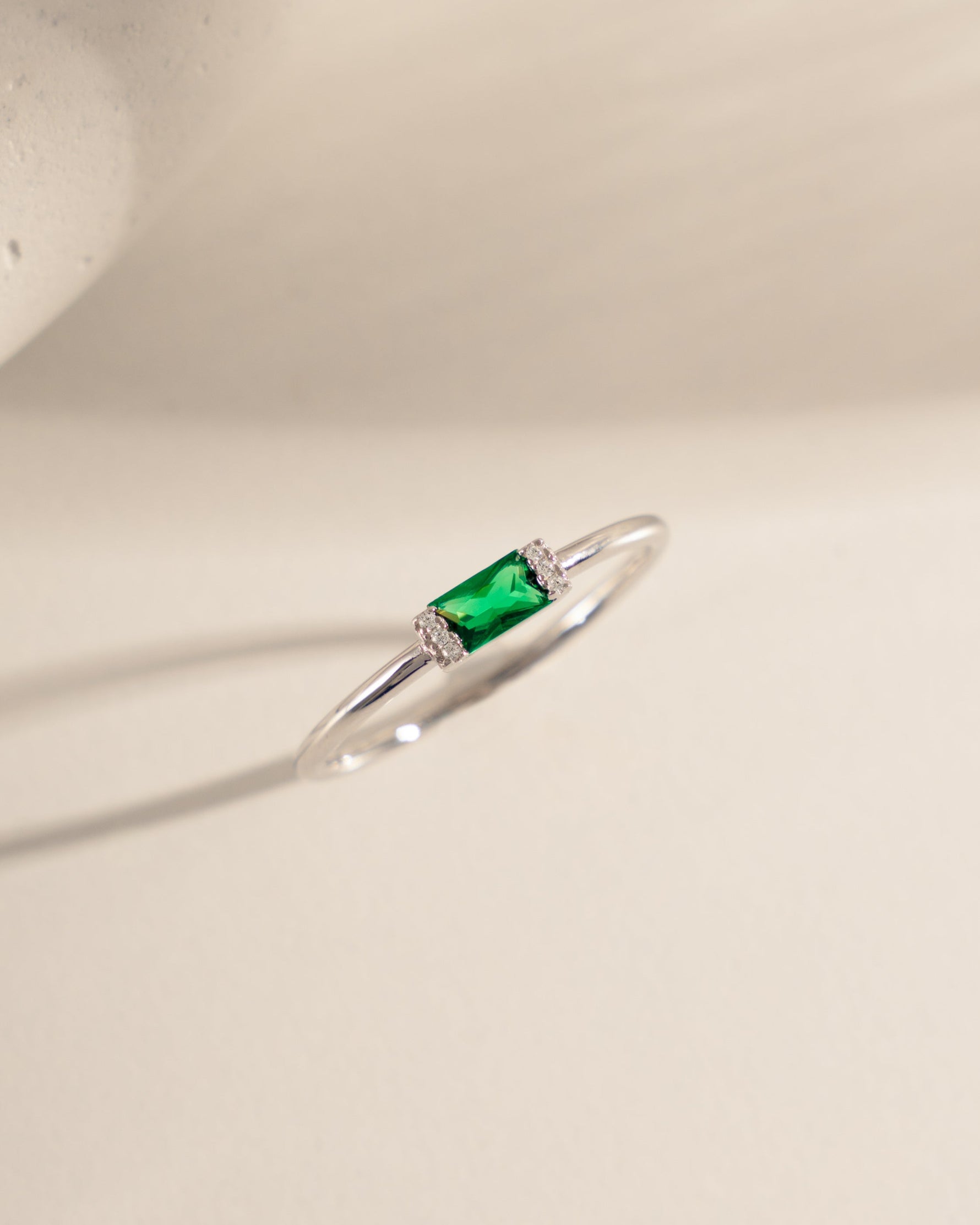 sterling silver cz ring with emerald green baguette 