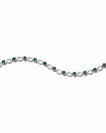 silver bracelet with emerald cubic zirconia stones