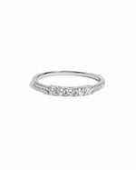 silver ring with small cz stones and 5 bigger cubic zirconia stones