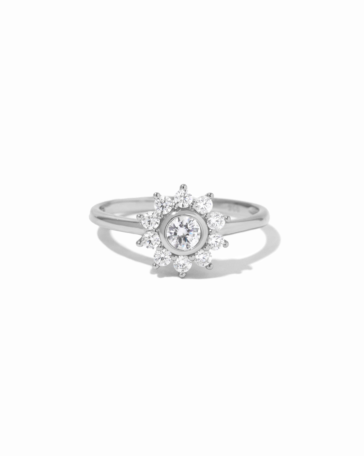 Silver flower ring by Sami Jewels featuring intricate floral design and elegant craftsmanship.