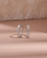 closeup image of cubic zirconia studded hoop earrings